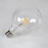 GloboStar® 99012 Λάμπα LED Long Filament E27 G125 Γλόμπος 4W 400lm 360° AC 220-240V IP20 Φ12.5 x Υ18cm Θερμό Λευκό 2700K με Διάφανο Γυαλί - Dimmable - 3 Years Warranty - ledmania.gr