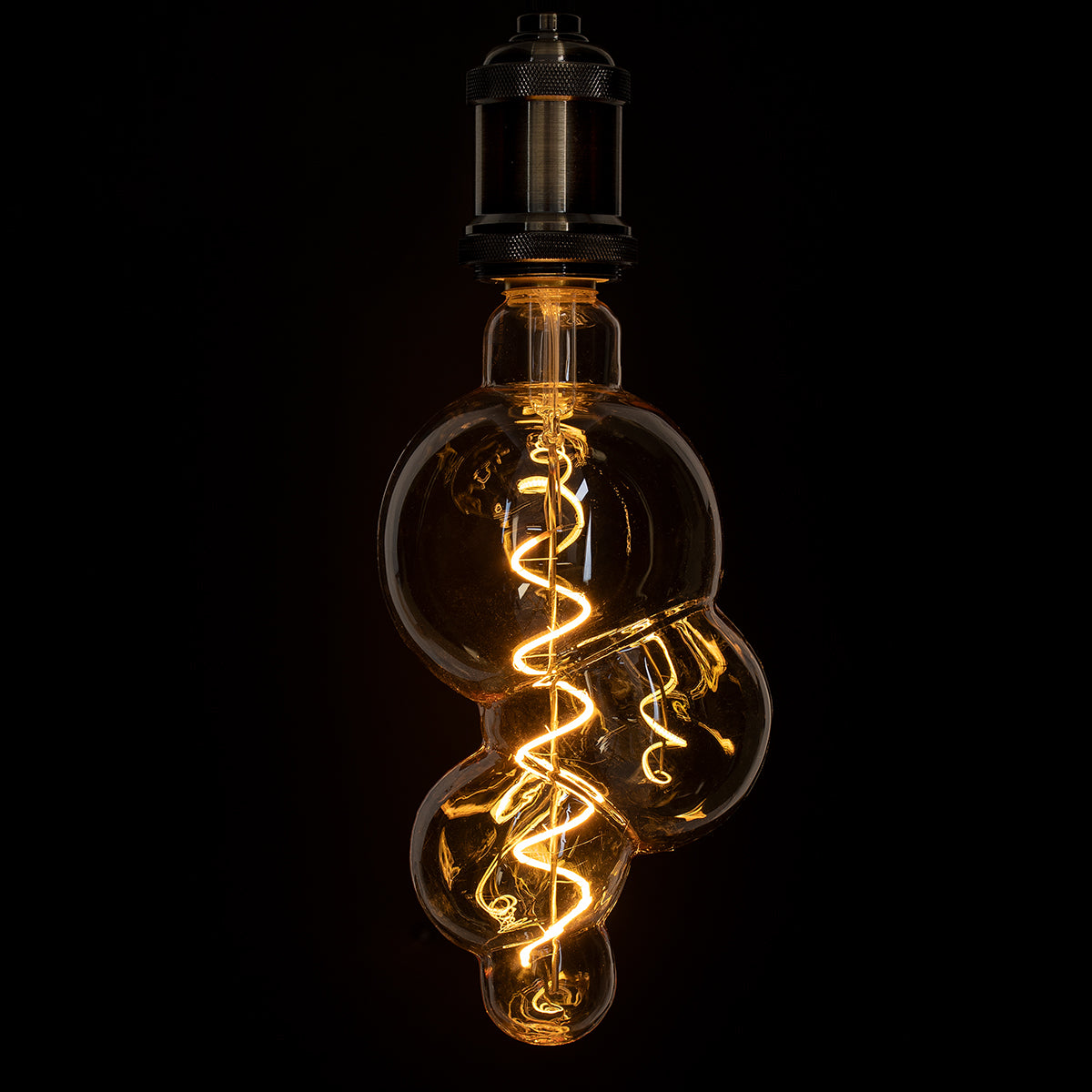 GloboStar® 99021 Λάμπα LED Soft S Spiral Filament E27 BB100 BUBBLES Γλόμπος 6W 420lm 360° AC 220-240V IP20 Φ10 x Υ24cm Ultra Θερμό Λευκό 2200K με Μελί Γυαλί - Dimmable - 3 Years Warranty - ledmania.gr