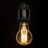 GloboStar® 99038 LED Long Filament Bulb E27 A60 Globe 10W 900lm 360° AC 220-240V IP20 D6 x H10.5cm Ultra Θερμό Λευκό 2200K με Μελί Γυαλί - Dimmable - 3 Years Warranty - ledmania.gr