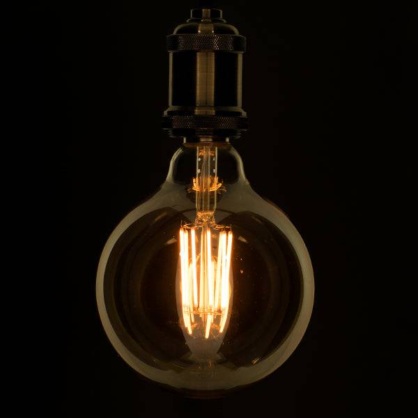 GloboStar® 99044 Λάμπα E27 G125 Γλόμπος LED LONG FILAMENT 12W 1260 lm 320° AC 85-265V Edison Retro με Μελί Γυαλί Ultra Θερμό Λευκό 2200 K Dimmable - ledmania.gr