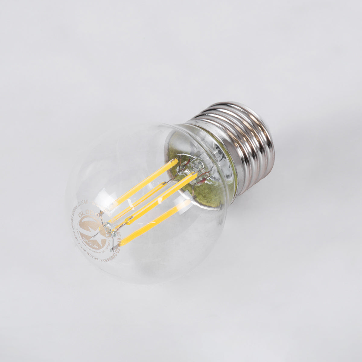 GloboStar® 99052 Λάμπα LED Long Filament E27 G45 Γλομπάκι 6W 660lm 360° AC 220-240V IP20 Φ4.5 x Υ7.5cm Φυσικό Λευκό 4000K με Διάφανο Γυαλί - Dimmable - 3 Years Warranty - ledmania.gr