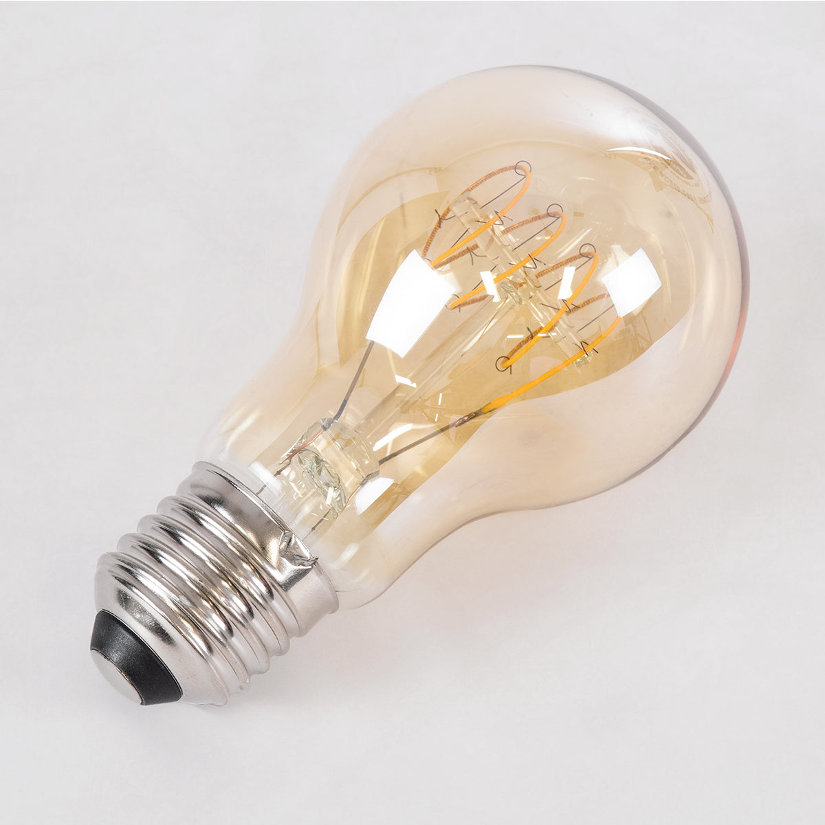 GloboStar® 99059 Λάμπα LED Ultra Thin Soft S Spiral Filament E27 A60 Γλόμπος 4W 280lm 360° AC 220-240V IP20 Φ6 x Υ10.5cm Ultra Θερμό Λευκό 2200K με Μελί Γυαλί - Dimmable - 3 Years Warranty - ledmania.gr