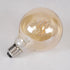 GloboStar® 99060 Λάμπα LED Ultra Thin Soft S Spiral Filament E27 G95 Γλόμπος 4W 280lm 360° AC 220-240V IP20 Φ9.5 x Υ13.5cm Ultra Θερμό Λευκό 2200K με Μελί Γυαλί - Dimmable - 3 Years Warranty - ledmania.gr