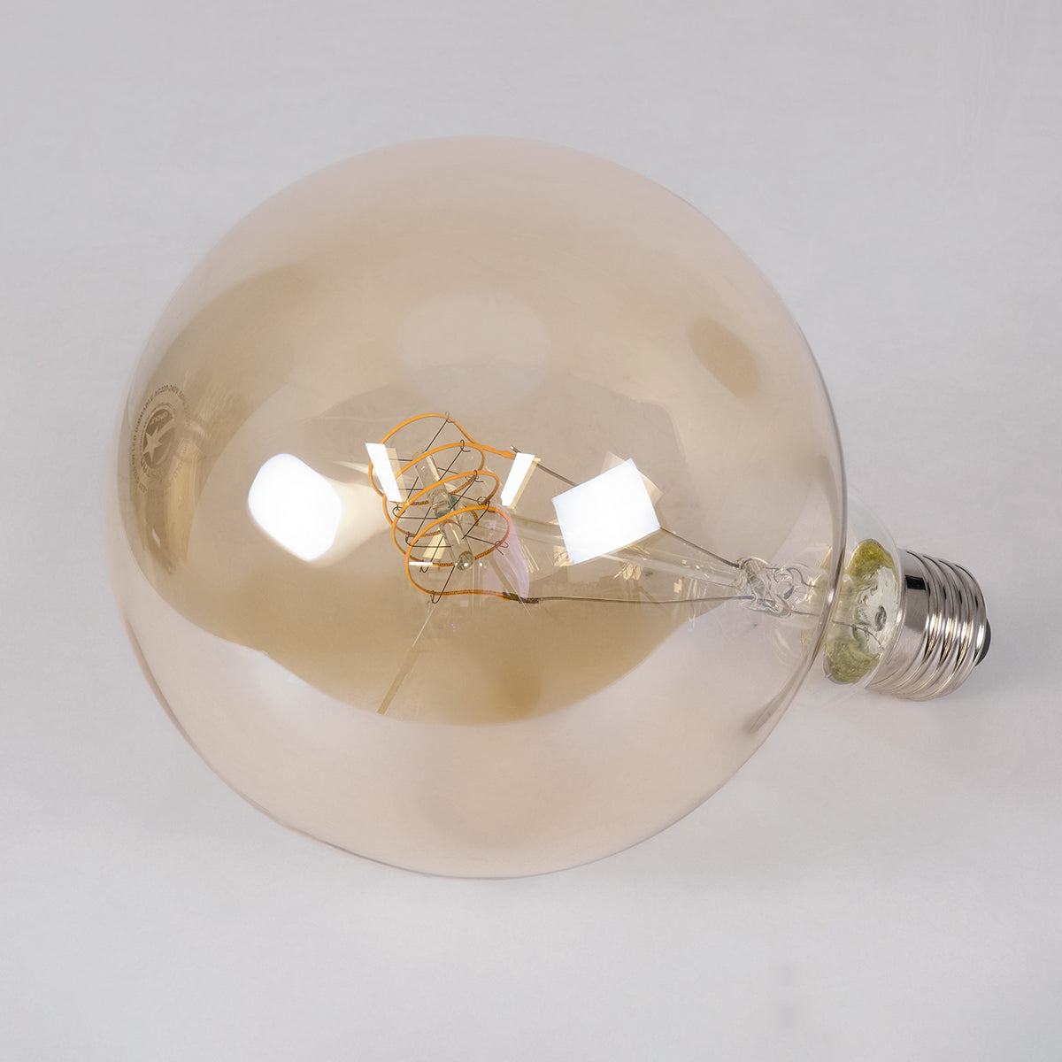 GloboStar® 99081 Λάμπα LED Ultra Thin Soft S Spiral Filament E27 G125 Γλόμπος 4W 280lm 360° AC 220-240V IP20 Φ12.5 x Υ18cm Ultra Θερμό Λευκό 2200K με Μελί Γυαλί - Dimmable - 3 Years Warranty - ledmania.gr