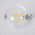 GloboStar® 99084 Λάμπα LED Long Filament E27 G95 Γλόμπος 4W 840lm 360° AC 220-240V IP20 Φ9.5 x Υ13.8cm Θερμό Λευκό 2700K με Διάφανο Γυαλί - Pro Series 210lm/W - A Ενεργειακή Κλάση - 3 Χρόνια Εγγύηση - ledmania.gr