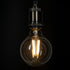 GloboStar® 99084 Λάμπα LED Long Filament E27 G95 Γλόμπος 4W 840lm 360° AC 220-240V IP20 Φ9.5 x Υ13.8cm Θερμό Λευκό 2700K με Διάφανο Γυαλί - Pro Series 210lm/W - A Ενεργειακή Κλάση - 3 Χρόνια Εγγύηση - ledmania.gr