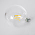 GloboStar® 99085 Λάμπα LED Long Filament E27 G125 Γλόμπος 4W 840lm 360° AC 220-240V IP20 Φ12.5 x Υ13.8cm Θερμό Λευκό 2700K με Διάφανο Γυαλί - Pro Series 210lm/W - A Ενεργειακή Κλάση - 3 Χρόνια Εγγύηση - ledmania.gr