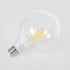 GloboStar® 99085 Λάμπα LED Long Filament E27 G125 Γλόμπος 4W 840lm 360° AC 220-240V IP20 Φ12.5 x Υ13.8cm Θερμό Λευκό 2700K με Διάφανο Γυαλί - Pro Series 210lm/W - A Ενεργειακή Κλάση - 3 Χρόνια Εγγύηση - ledmania.gr