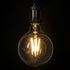 GloboStar® 99085 Λάμπα LED Long Filament E27 G125 Γλόμπος 4W 840lm 360° AC 220-240V IP20 Φ12.5 x Υ13.8cm Θερμό Λευκό 2700K με Διάφανο Γυαλί - Pro Series 210lm/W - A Ενεργειακή Κλάση - 3 Χρόνια Εγγύηση - ledmania.gr