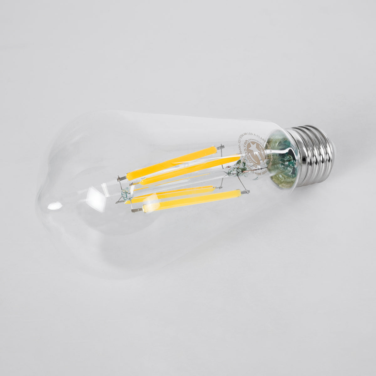 GloboStar® 99086 Λάμπα LED Long Filament E27 ST64 Αχλάδι 4W 840lm 360° AC 220-240V IP20 Φ6.4 x Υ14.5cm Θερμό Λευκό 2700K με Διάφανο Γυαλί - Pro Series 210lm/W - A Ενεργειακή Κλάση - 3 Χρόνια Εγγύηση - ledmania.gr