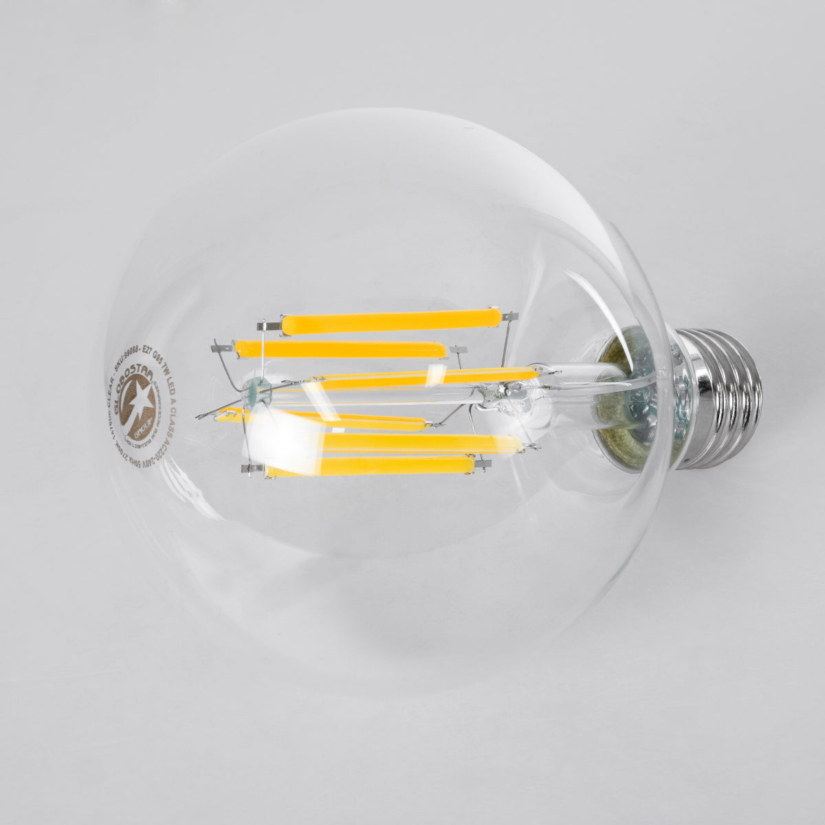 GloboStar® 99088 Λάμπα LED Long Filament E27 G95 Γλόμπος 7W 1470lm 360° AC 220-240V IP20 Φ9.5 x Υ13.8cm Θερμό Λευκό 2700K με Διάφανο Γυαλί - Pro Series 210lm/W - A Ενεργειακή Κλάση - 3 Χρόνια Εγγύηση - ledmania.gr