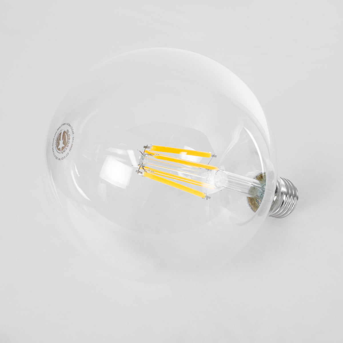 GloboStar® 99089 Λάμπα LED Long Filament E27 G125 Γλόμπος 7W 1470lm 360° AC 220-240V IP20 Φ12.5 x Υ13.8cm Θερμό Λευκό 2700K με Διάφανο Γυαλί - Pro Series 210lm/W - A Ενεργειακή Κλάση - 3 Χρόνια Εγγύηση - ledmania.gr