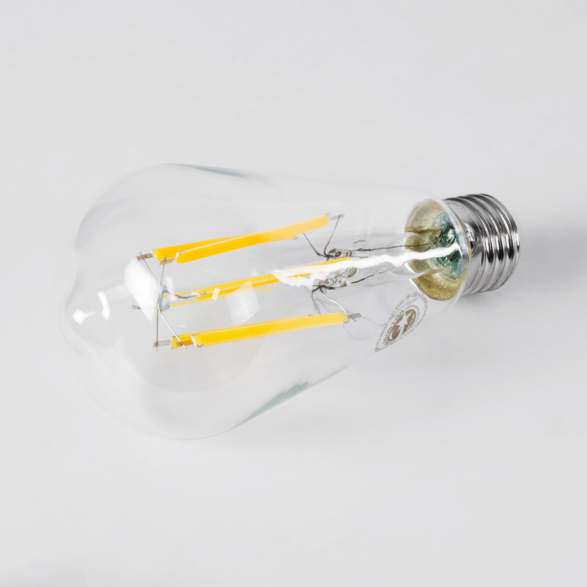 GloboStar® 99090 Λάμπα LED Long Filament E27 ST64 Αχλάδι 7W 1470lm 360° AC 220-240V IP20 Φ6.4 x Υ14.5cm Θερμό Λευκό 2700K με Διάφανο Γυαλί - Pro Series 210lm/W - A Ενεργειακή Κλάση - 3 Χρόνια Εγγύηση - ledmania.gr