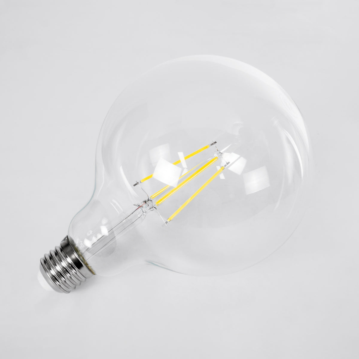 GloboStar® 99093 Λάμπα LED Long Filament E27 G125 Γλόμπος 4W 840lm 360° AC 220-240V IP20 Φ12.5 x Υ13.8cm Φυσικό Λευκό 4000K με Διάφανο Γυαλί - Pro Series 210lm/W - A Ενεργειακή Κλάση - 3 Χρόνια Εγγύηση - ledmania.gr