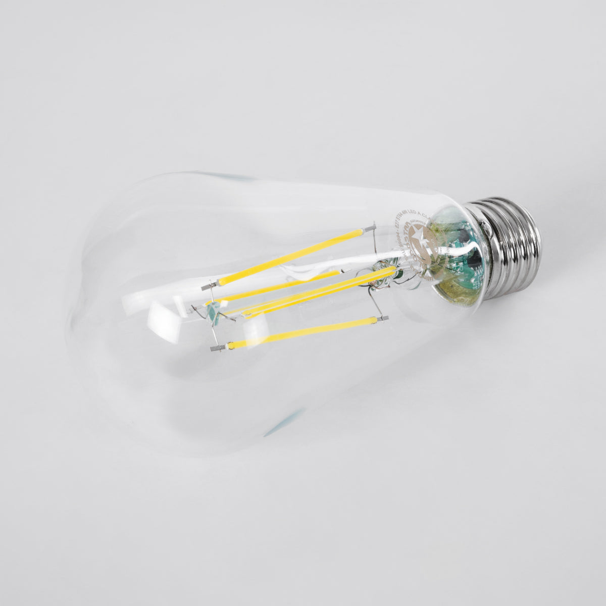 GloboStar® 99094 Λάμπα LED Long Filament E27 ST64 Αχλάδι 4W 840lm 360° AC 220-240V IP20 Φ6.4 x Υ14.5cm Φυσικό Λευκό 4000K με Διάφανο Γυαλί - Pro Series 210lm/W - A Ενεργειακή Κλάση - 3 Χρόνια Εγγύηση - ledmania.gr