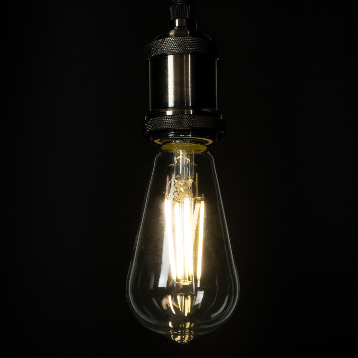 GloboStar® 99094 Λάμπα LED Long Filament E27 ST64 Αχλάδι 4W 840lm 360° AC 220-240V IP20 Φ6.4 x Υ14.5cm Φυσικό Λευκό 4000K με Διάφανο Γυαλί - Pro Series 210lm/W - A Ενεργειακή Κλάση - 3 Χρόνια Εγγύηση - ledmania.gr